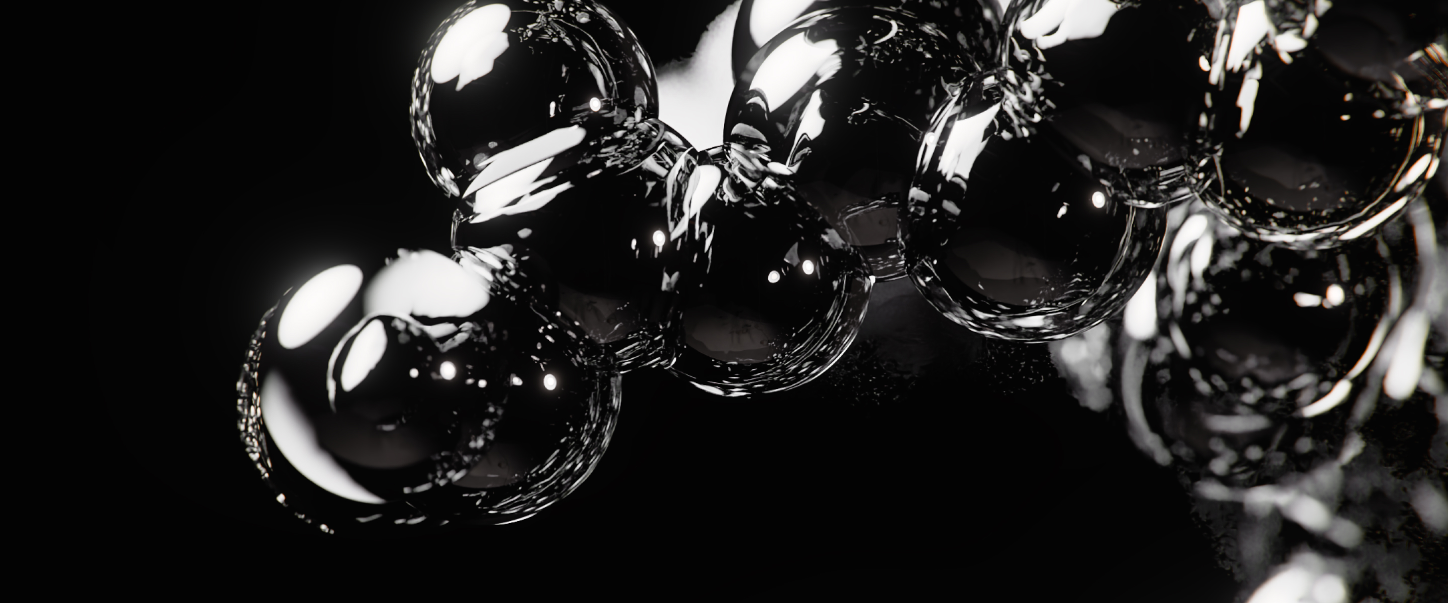 Shiny black molecular spheres on a black background – visualization of an active ingredient